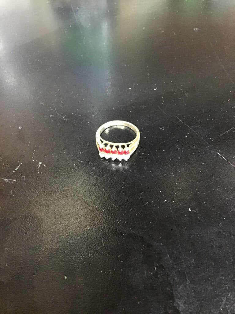 Gold Ring with Red Gemstones
