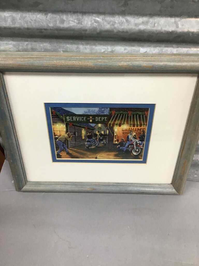 Framed Artwork of Motorcycles in Service Department